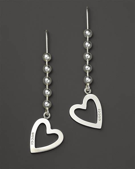 gucci toggle silver heart drop earrings|gucci heart shaped earrings.